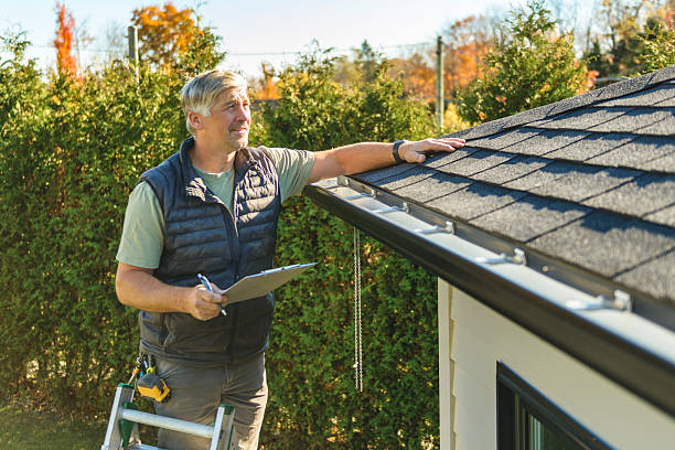 Professional Roofing technician working in Lawler, IA